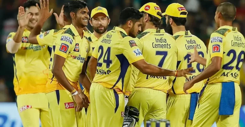 Chennai Super Kings team celebrating after taking wicket in IPL