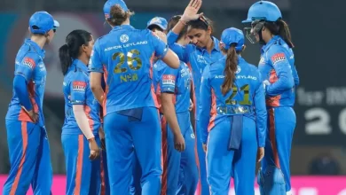 Mumbai Indians Women celebrating after taking a wicket