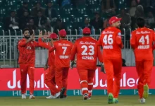 Islamabad United players celebrating after taking a wicket against Karachi Kings in a PSL 2024 match.