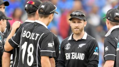 New Zealand cricket team strategizing with their captain