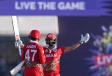 Aaqib Ilyas of Oman celebrating his knock that secured their spot in the final