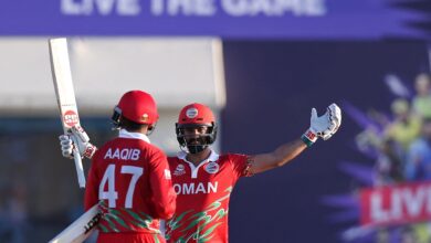 Aaqib Ilyas of Oman celebrating his knock that secured their spot in the final