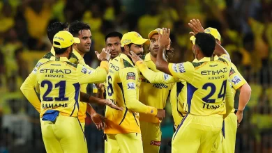 CSK players celebrating after a wicket in IPL 2024