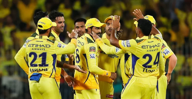 CSK players celebrating after a wicket in IPL 2024