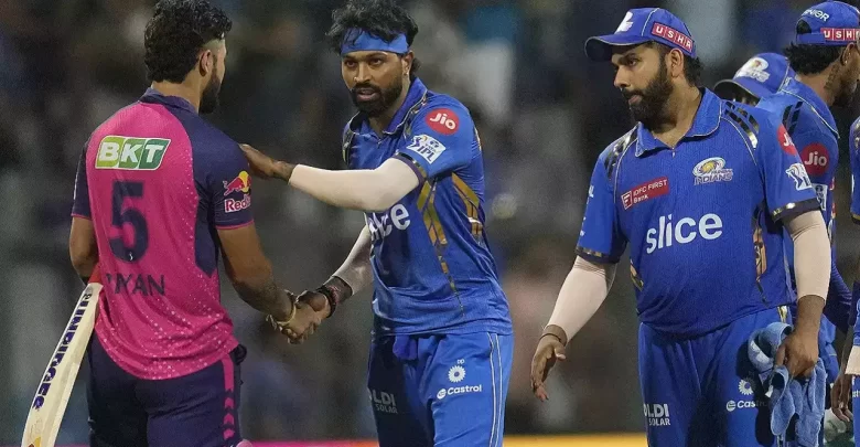 Hardik Pandya of Mumbai Indians shaking hands with a Rajasthan Royals player in IPL.