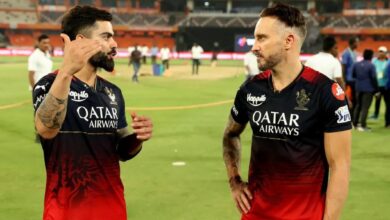 RCB player Kohli and Faf du Plessis discussing strategy in IPL 2024