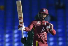 Amir Jangoo celebrates his century in debut ODI against Bangladesh.