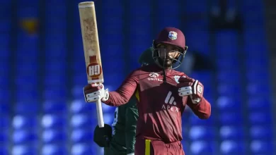 Amir Jangoo celebrates his century in debut ODI against Bangladesh.