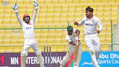 Rashid Khan celebrates after taking the wicket of Brian Bennett during the second Test against Zimbabwe.