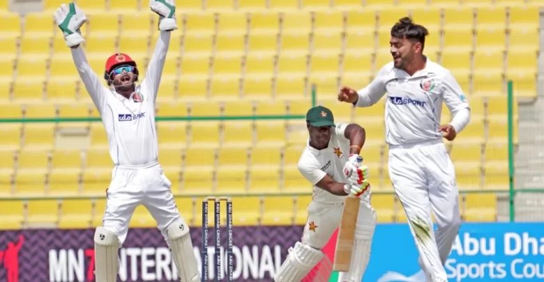 Rashid Khan celebrates after taking the wicket of Brian Bennett during the second Test against Zimbabwe.