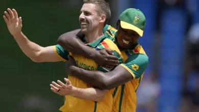 Anrich Nortje celebrates taking a crucial wicket during a Champions Trophy match.