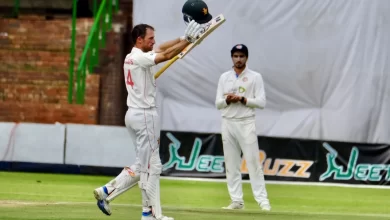 Sean Williams raising his bat after scoring a century in the first Test