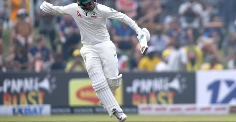 Usman Khawaja celebrates after scoring a century in the Galle Test against Sri Lanka