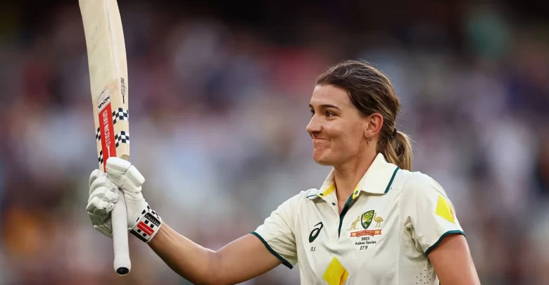 Annabel Sutherland celebrates her record-breaking Test century at the MCG during the day-night Ashes Test against England.