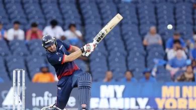 Andries Gous raises his bat after scoring a half-century against Namibia in WCL 2