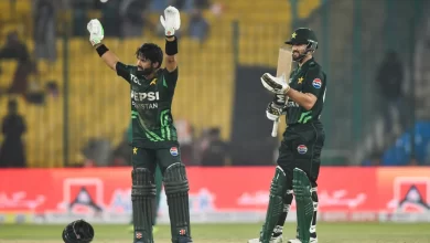 Mohammad Rizwan and Salman Agha celebrate their record-breaking partnership in Pakistan’s successful run chase against South Africa.