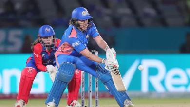 Nat Sciver-Brunt celebrates her half-century, leading Mumbai Indians to victory in WPL 2025.