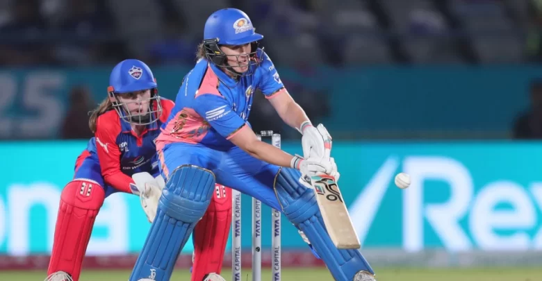 Nat Sciver-Brunt celebrates her half-century, leading Mumbai Indians to victory in WPL 2025.