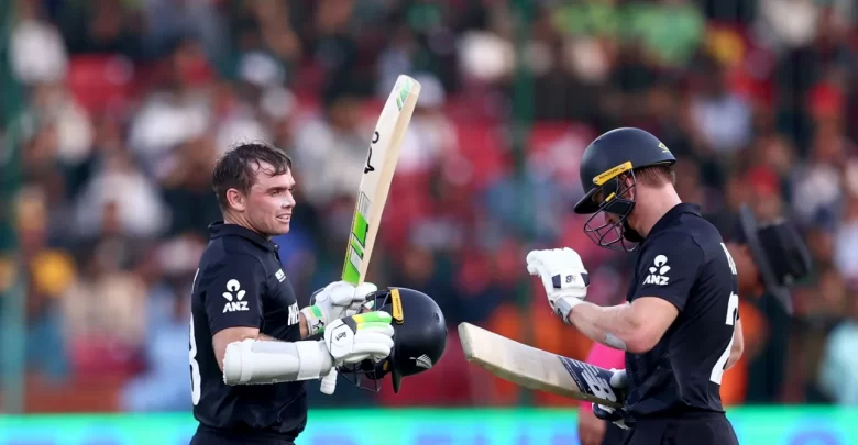 Tom Latham and Will Young celebrating their centuries during the ICC Champions Trophy opener against Pakistan.