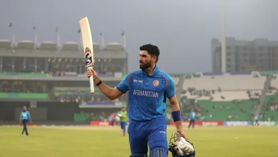 Ibrahim Zadran celebrates after scoring a record-breaking 177 runs against England in an ICC ODI match.