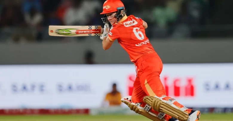 Beth Mooney celebrates her unbeaten 96, leading Gujarat Giants to a dominant total in WPL 2024.