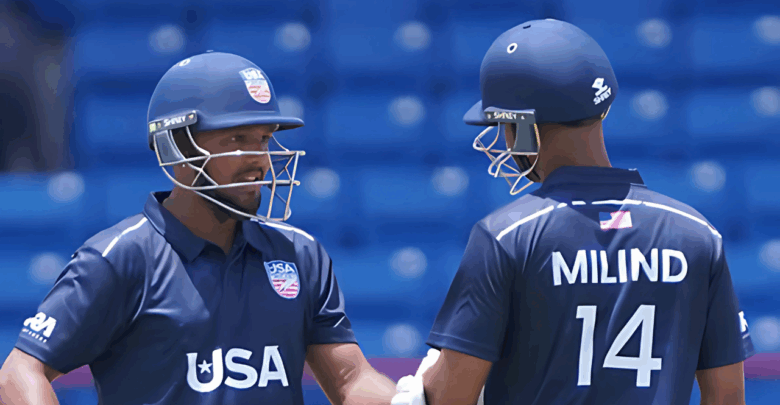 Smit Patel raises his bat after scoring a maiden international century for USA against Canada