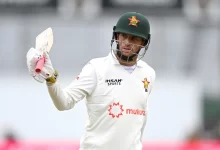 sean williams raises bat after scoring century against south africa in bulawayo test